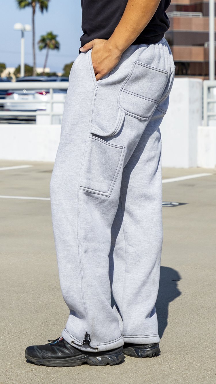 チャンピオン スウェットパンツ】カーキ色 横たわる